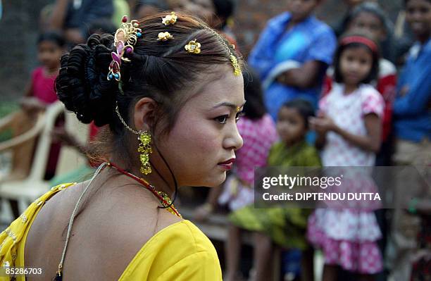 An Indian sex worker walks along a makeshift catwalk during a fashion show organised at the Khalpara red light area in Siliguri on March 7, 2009 on...