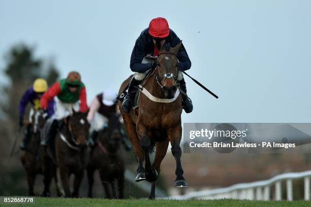 Bobs Worth ridden by Barry Geraghty races towards the finish to win the Lexus Steeplechase during day three of the Leopardstown Christmas Festival at...