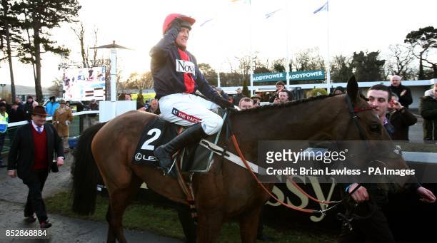 Barry Geraghty enters the parade ring aboard Bobs Worth after winning the Lexus Steeplechase during day three of the Leopardstown Christmas Festival...