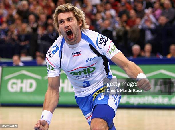 Stefan Schroeder of Hamburg celebrates after scoring during the Bundesliga match between HSV Hamburg and TV Grosswallstadt at the Color Line Arena on...