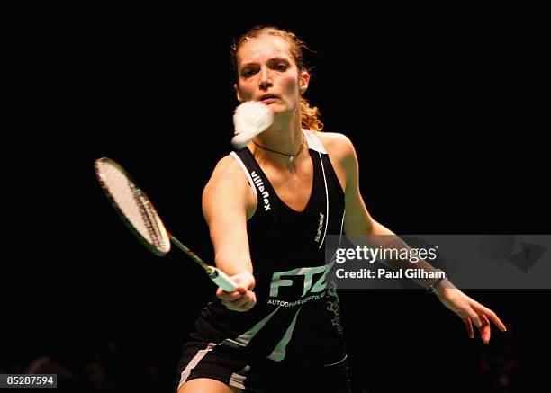 Tine Rasmussen of Denmark in action on her way to winning against Jiang Yanjiao of China during the semi-finals of the Yonex All England Open...