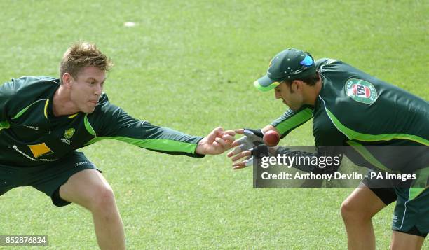 Australia's James Faulkner and Nathan Lyon catch during the nets session at the Sydney Cricket Ground, Australia.