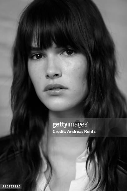 Model is seen backstage ahead of the Trussardi showd during Milan Fashion Week Spring/Summer 2018 on September 24, 2017 in Milan, Italy.