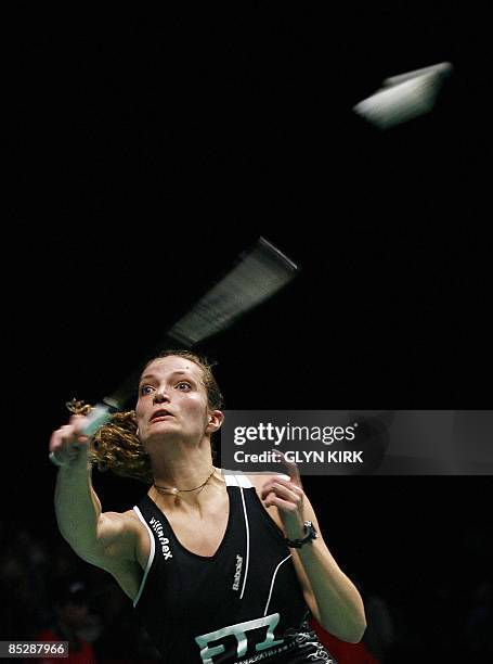 Tine Rasmussen of Denmark competes in her women's semi final match against Jiang Yanjiao of China during the All England Open Badminton Championships...