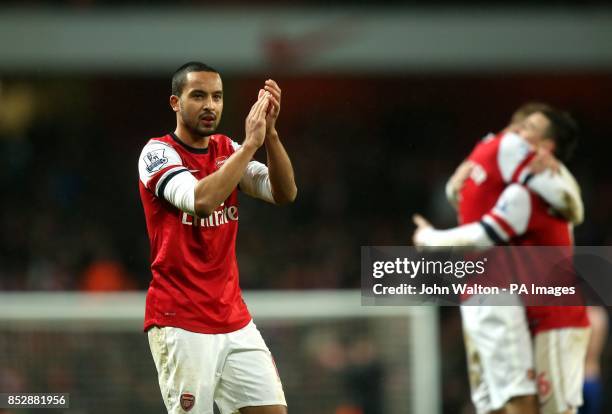 Arsenal's Theo Walcott applauds the fans at the end of the match during the Barclays Premier League match at the Emirates Stadium, London.