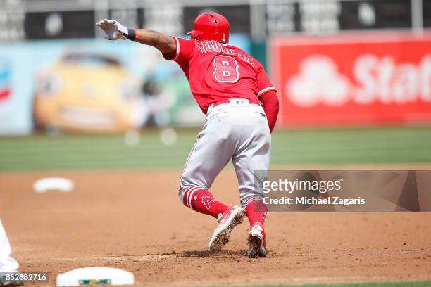Eric Young Jr. #8 of the Los Angeles Angels of Anaheim runs the bases during the game against the Oakland Athletics at the Oakland Alameda Coliseum...