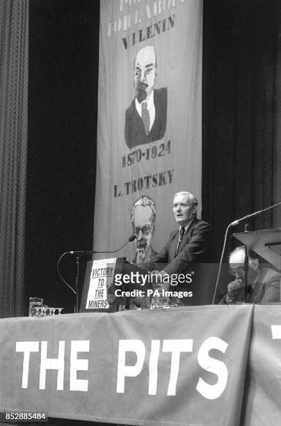 Labour MP Tony Benn, stood on a platform in front of portraits of Lenin and Trotsky, praises the courage of miners' leaders during a rally at...