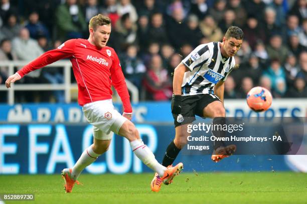 Newcastle United's Hatem Ben Arfa and Cardiff City's Aron Gunnarson battle for the ball during the FA Cup Third Round match at St James' Park,...