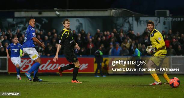 Macclesfield Town's Steve Williams watches his shot go past Sheffield Wednesday's goalkeeper Damian Martinez to score during the FA Cup Third Round...