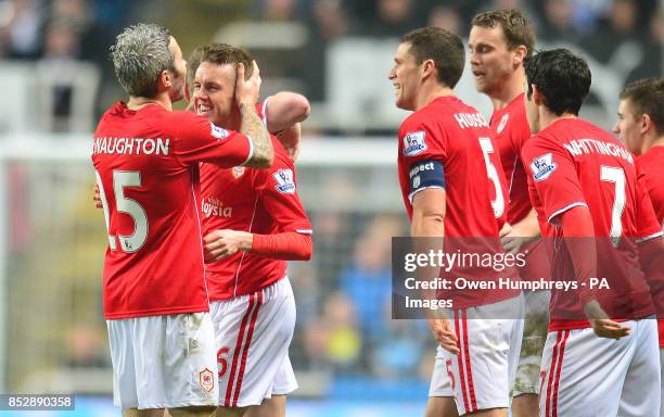 Cardiff City's Craig Noone celebrates his goal with Kevin McNaughton during the FA Cup Third Round match at St James' Park, Newcastle.