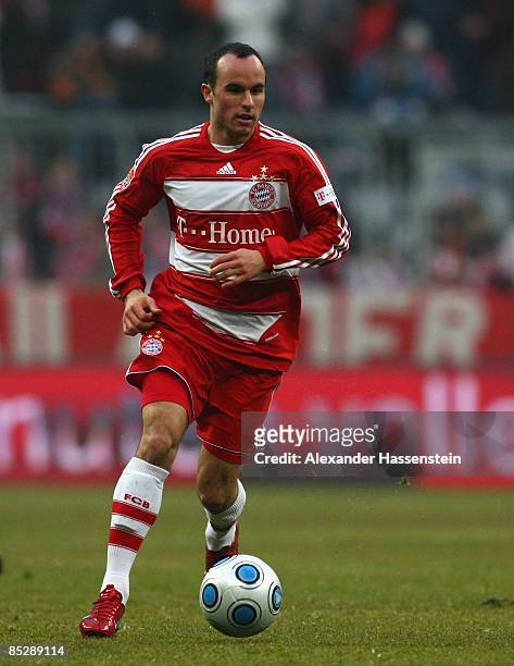 Landon Donovan of Muenchen runs with the ball in his last match for Bayern Munich during the Bundesliga match between FC Bayern Muenchen and Hannover...