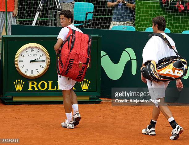 Jesse Huta Galung and Rogier Wassen of the Netherlands leave the court after losing during their day 2 Davis Cup 2009 World Group match between the...