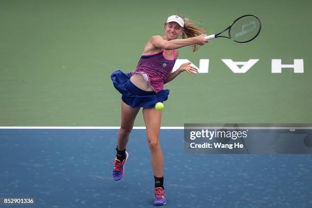 Mona Barthel of Germany serves against Monica Puig of Puerto Rico during 2017 Dongfeng Motor Wuhan Open at Optics Valley International Tennis Center...