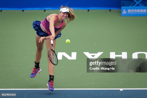 Mona Barthel of Germany serves against Monica Puig of Puerto Rico during 2017 Dongfeng Motor Wuhan Open at Optics Valley International Tennis Center...