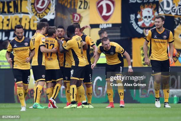 Manuel Konrad of Dresden celebrates his team's second goal with team mates during the Second Bundesliga match between SV Darmstadt 98 and SG Dynamo...