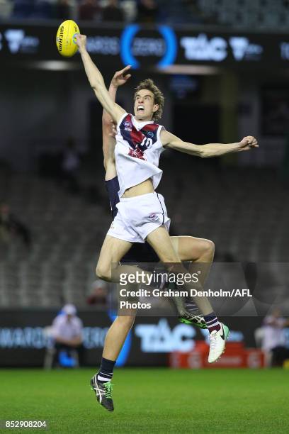 Benjamin King of the Sandringham Dragons jumps for a mark during the TAC Cup Grand Final match between Geelong and Sandringham at Etihad Stadium on...