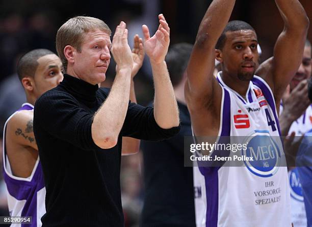 Head coach John Patrick and Charles Lee of Goettingen are seen after the Basketball Bundesliga match between MEG Goettingen and Alba Berlin at the...