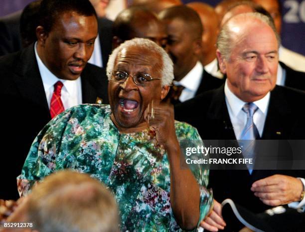 Capetown Archbishop Desmond Tutu burst into joy 15 May 2004 after the announcement that South Africa won the right to host the 2010 World Cup finals,...