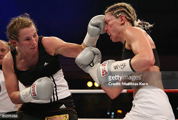 Magdalena Dahlen punches Alesia Graf during the WIBF and GBU World Championship fight between Alesia Graf of Germany and Magdalena Dahlen of Germany...