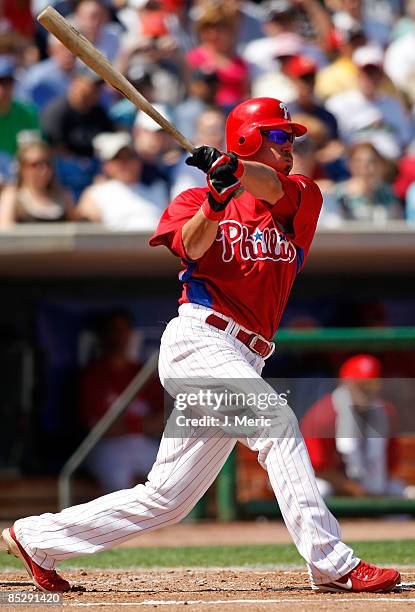 Designated hitter Greg Dobbs of the Philadelphia Phillies fouls off a pitch against the Detroit Tigers during a Grapefruit League Spring Training...