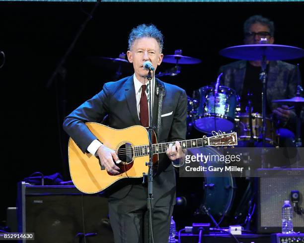 Lyle Lovett performs in concert during the "Texas Strong: Hurricane Harvey Can't Mess With Texas" benefit at The Frank Erwin Center on September 22,...