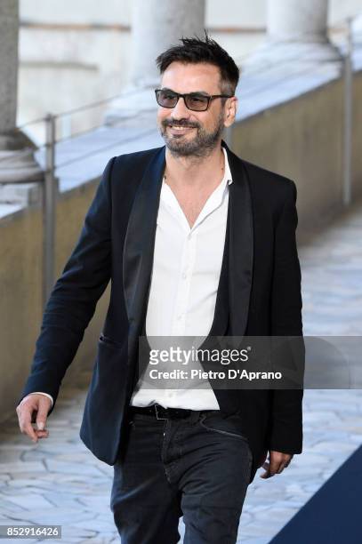Designer Alessandro de Benedetti acknowledges the applause of the audience at the Mila Schon show during Milan Fashion Week Spring/Summer 2018 on...