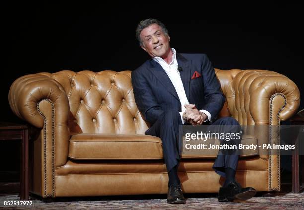 Sylvester Stallone appears onstage at the London Palladium in Central London for An Evening with Sylvester Stallone on January 11, 2014.