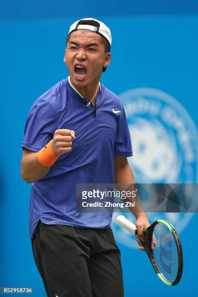 Zihao Xia of China celebrates a point during the match against Mate Pavic of Croatia during Qualifying second round of 2017 ATP Chengdu Open at...