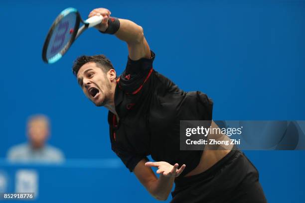 Mate Pavic of Croatia in action during the match against Zihao Xia of China during Qualifying second round of 2017 ATP Chengdu Open at Sichuan...