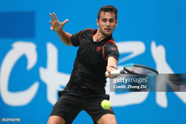 Mate Pavic of Croatia returns a shot during the match against Zihao Xia of China during Qualifying second round of 2017 ATP Chengdu Open at Sichuan...