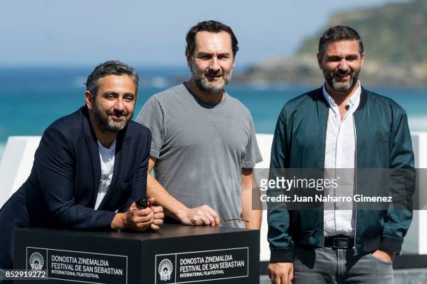 Eric Toledano, Olivier Nakache and Gilles Lellouche attends 'Le Sens De La Fete / C'Est La Vie' photocall during 65th San Sebastian Film Festival on...
