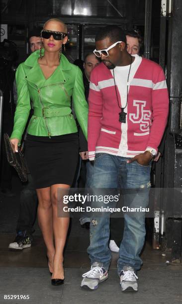 Kanye West and Amber Rose attend the Jeremy Scott Ready-to-Wear A/W 2009 fashion show during Paris Fashion Week at Faculte de Medecine on March 7,...