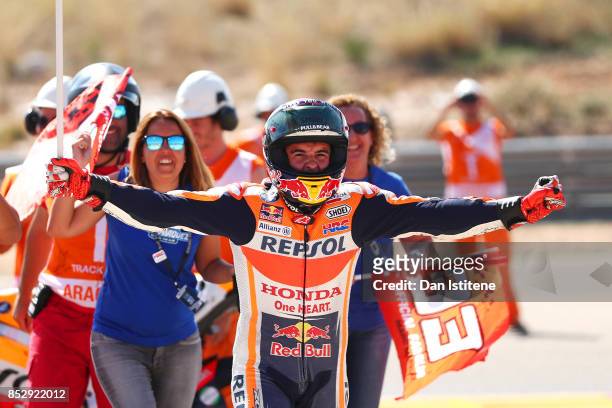Marc Marquez of Spain and the Repsol Honda Team celebrates victory after the MotoGP of Aragon at Motorland Aragon Circuit on September 24, 2017 in...