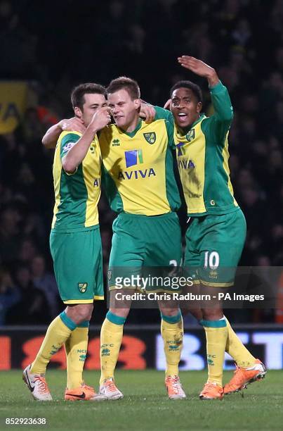 Norwich City's Ryan Bennett celebrates scoring their first goal of the game with team-mates Leroy Fer and Russell Martin