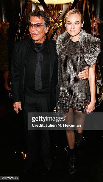 Roberto Cavalli and Diane Kruger attend the Roberto Cavalli opening boutique party during Paris Fashion Week ready-to-wear Autumn / Winter 2009 on...