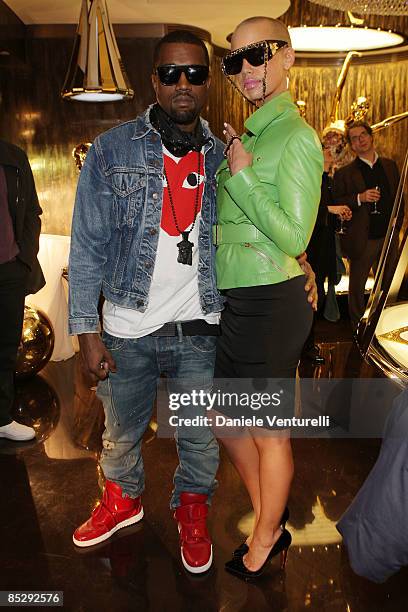 Kanye West and Amber Rose attend the Roberto Cavalli opening boutique party during Paris Fashion Week ready-to-wear Autumn / Winter 2009 on March 7,...