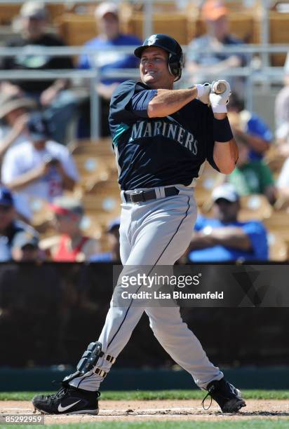 Mike Sweeney of the Seattle Mariners at bat during a Spring Training game against the Los Angeles Dodgers at Camelback Ranch on March 7, 2009 in...