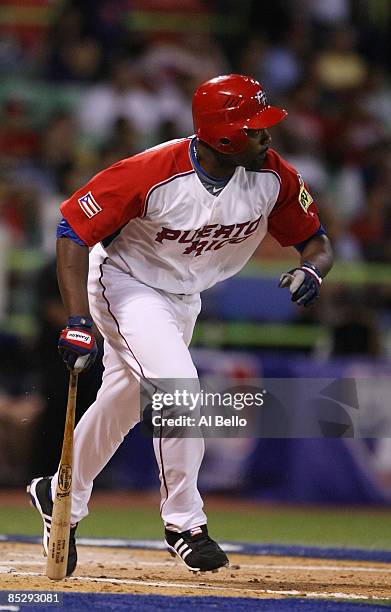 Carlos Delgado of Puerto Rico runs after hitting the ball against Panama during the 2009 World Baseball Classic Pool D match on March 7, 2009 at...