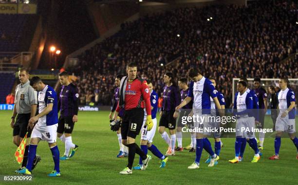 Birmingham City and Bristol Rovers players walk out onto the pitch