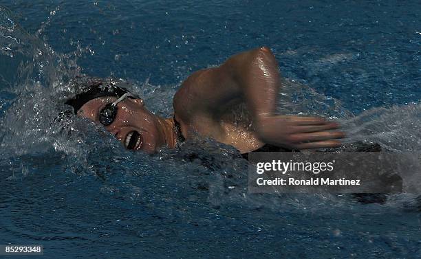 Kara Lynn Joyce swims in the Women's 100 LC Meter Freestyle final during day three of the 2009 USA Swimming Austin Grand Prix on March 7, 2009 at the...