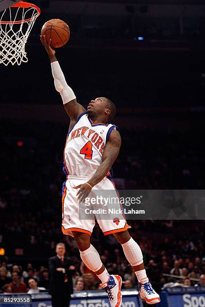Nate Robinson of the New York Knicks lays the ball up against the Charlotte Bobcats on March 7, 2009 at Madison Square Garden in New York City. NOTE...