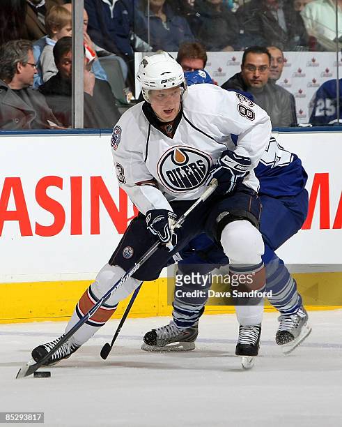 Ales Hemsky of the Edmonton Oilers carries the puck against the Toronto Maple Leafs during their NHL game at the Air Canada Centre March 7, 2009 in...