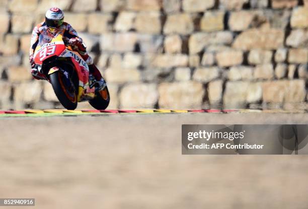 Repsol Honda Team's Spanish rider Marc Marquez rides during MotoGP race of the Moto Grand Prix of Aragon at the Motorland circuit in Alcaniz on...