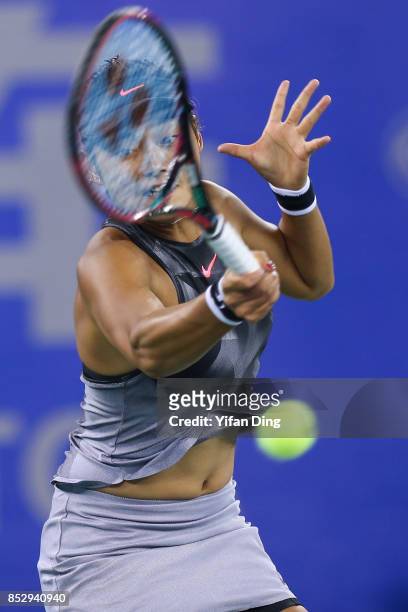 Wang Yafan plays a forehand during the match against Sorana Cirstea on Day 1 of 2017 Dongfeng Motor Wuhan Open at Optics Valley International Tennis...