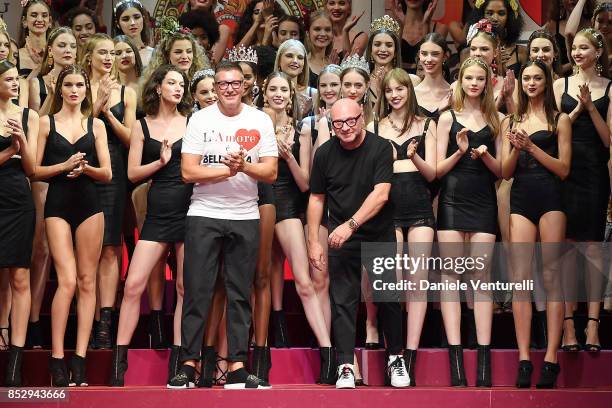 Designer Stefano Gabbana and Domenico Dolce aknowledge the applause of the public after the Dolce & Gabbana show during Milan Fashion Week...