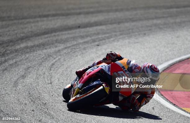Repsol Honda Team's Spanish rider Marc Marquez rides during MotoGP race of the Moto Grand Prix of Aragon at the Motorland circuit in Alcaniz on...