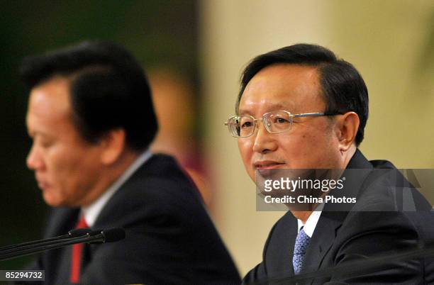 Chinese Foreign Minister Yang Jiechi listens to a question at a press conference held on the sideline of the second session of the 11th National...