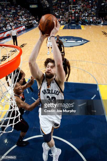 Marc Gasol of the Memphis Grizzlies dunks in a game against the Philadelphia 76ers on March 7, 2009 at FedExForum in Memphis, Tennessee. NOTE TO...
