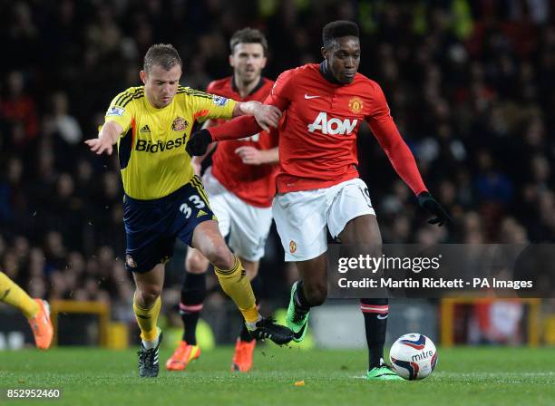 Manchester United's Danny Welbeck battles for the ball with Sunderland's Lee Cattermole during the Capital One Cup, Semi Final, Second Leg at Old...