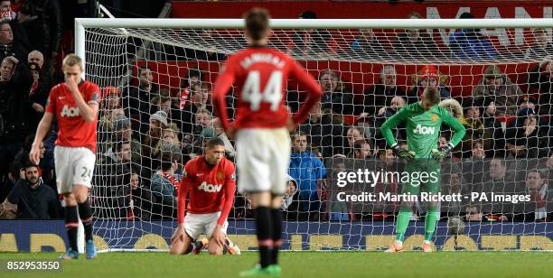 Manchester United's David De Gea shows his dejection after his mistake lead to Sunderland's equalising goal during the Capital One Cup, Semi Final,...